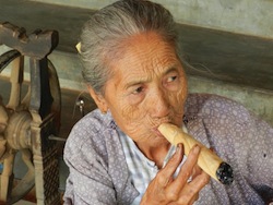 Grandmother smoking cheroot